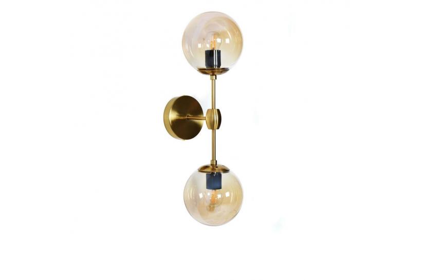 Applique lampada da parete moderno di design in metallo colore ottone con paralumi sfera in vetro colore ambra Zodiak W2