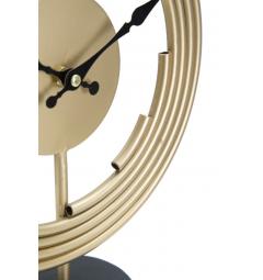 particolare della struttura in ferro dell'elegante orologio da tavolo