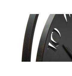 particolare della cornice dell'orologio da parete nero in metallo