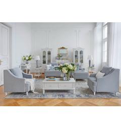 salotto con divani in velluto blu grigiastro chaise longue, mobili bianchi