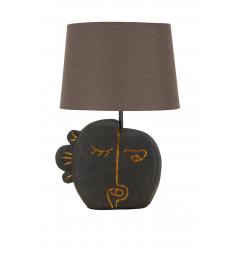 Lampada da tavolo in resina dalla forma ispirata ad un volto tribale