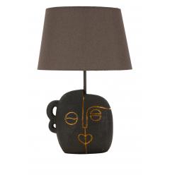 Lampada da tavolo in resina dalla forma ispirata ad un volto tribale
