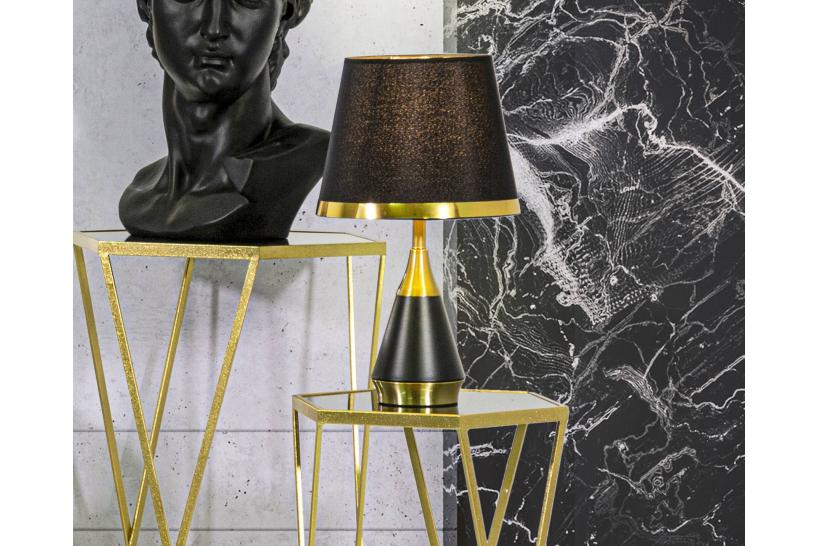 Lampada da tavolo in metallo nero e dorato dal design semplice ed essenziale Lampada da tavolo in metallo nero e dorato dal design semplice ed essenziale