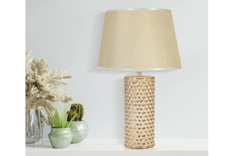 Lampada da tavolo in ceramica dorata con eleganti decorazioni in rilievo