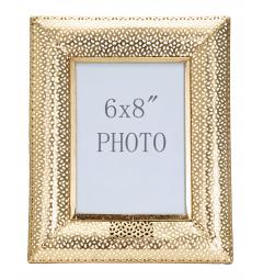 Elegante cornice portafoto in metallo dorato impreziosita da eleganti intagli